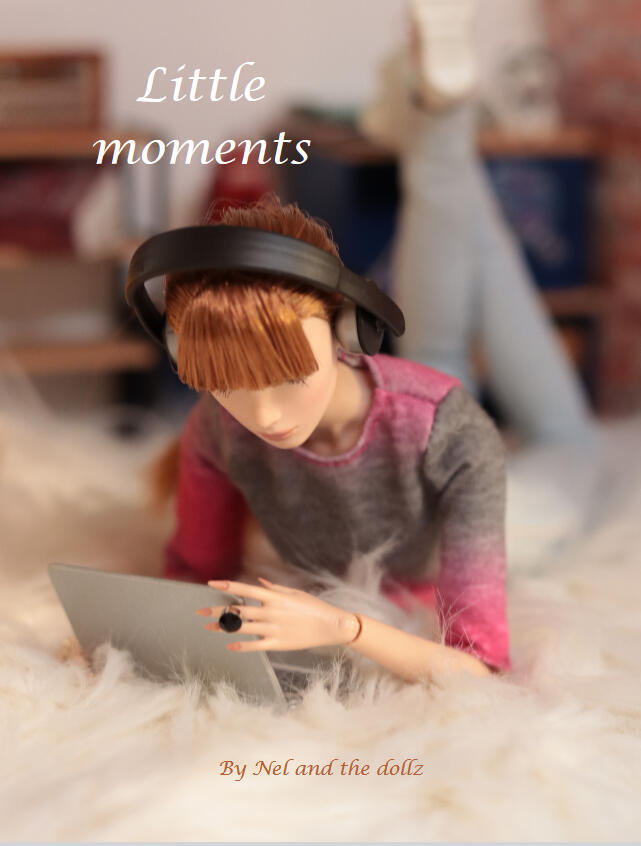 Cover of the photo book Little Moments showing a doll sitting on a soft rug, wearing headphones and looking at a laptop in a quiet, intimate atmosphere