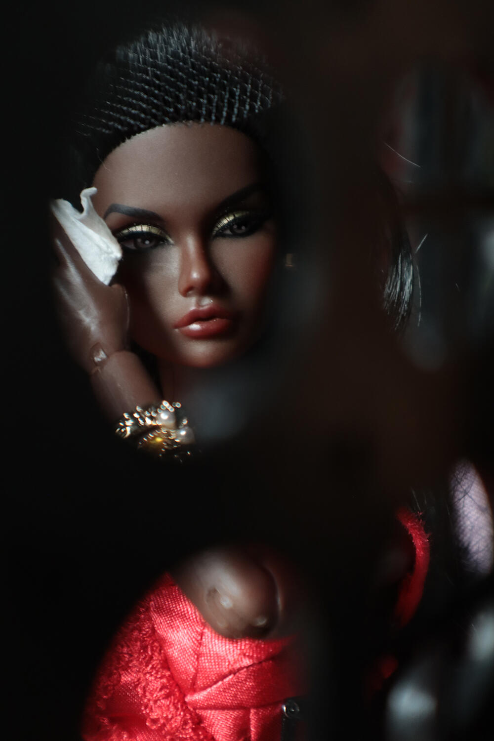Symbolic black Poppy Parker doll portrait with sacred and dramatic emotional atmosphere
