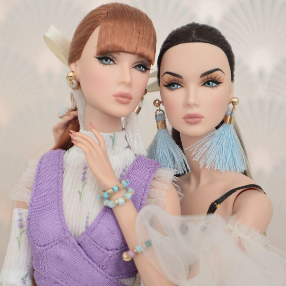 Portraits of two twin dolls, Lilith Blair and Eden Blair